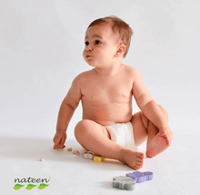 Load image into Gallery viewer, Baby seating with Nateen diaper_premium_biodegradable_sustainable_ecoliving_ecofriendly compostable leakproof soft absorbent
